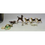 A Collection of Beswick and unmarked Animal Figures including Dogs, Horses and Woodcock. Some broken