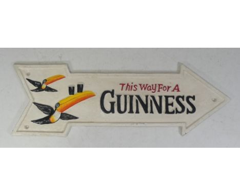 Cast Iron advertising sign as an Arrow "This Way for a Guinness, L41 x h.13cm.