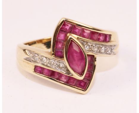 Ruby and diamond 9ct gold cross-over ring hallmarked    Condition Report   Click here for further images, condition, auction 