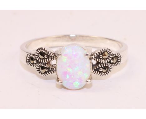 Single stone opal and marcasite ring stamped 925   Condition Report   Click here for further images, condition, auction times