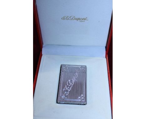 A boxed Dupont line two lighter with paperwork etc 