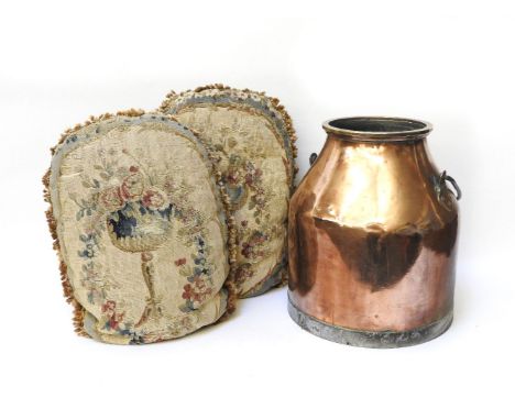 A 19th century copper churn with looped handle, together with a pair of antique needlework cushions, each decorated with a va