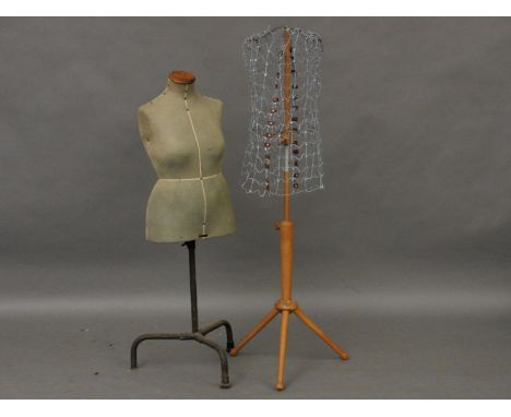 An early 20th century singer dress makers mannequin, together with one other