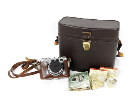 A Voss Diax 11b vintage camera, 1956-1957 with instruction book and associated carrier
