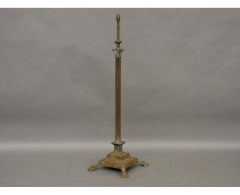 A standard lamp, with brass corinthian column