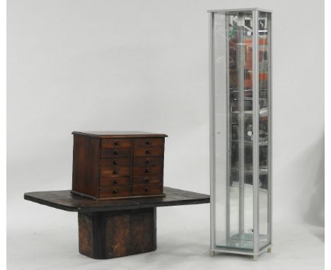 A table top chest with twelve drawers, together with a tile top coffee table, and Ikea tall cabinet