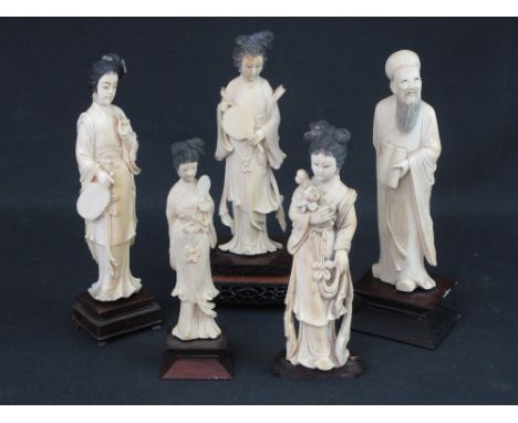 GROUP OF FIVE ASSORTED CHINESE CARVED IVORY FIGURES to include a scholar holding scroll and three women holding fans or flowe