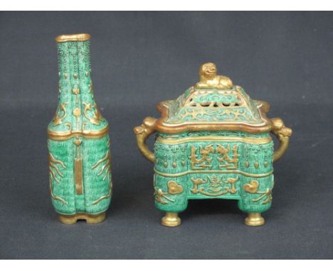 CHINESE PORCELAIN MINIATURE CASKET with pierced cover surmounted by Dog of Fo, mask loop handles to the body with projecting 