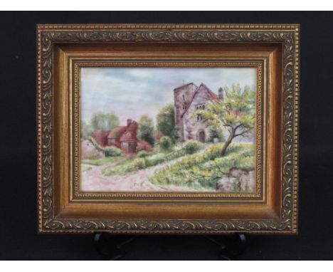 ROYAL WORCESTER BONE CHINA HAND-PAINTED PLAQUE by Terence Nutt, depicting church, village landscape, within gilt frame, certi