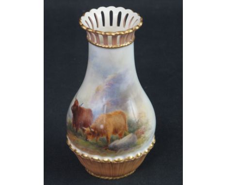 ROYAL WORCESTER PORCELAIN BALUSTER SHAPED VASE with reticulated flared rim, hand-painted, depicting Highland cattle within la