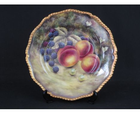 ROYAL WORCESTER BONE CHINA CABINET PLATE hand-painted with fruit within a mossy background and gilt shaped edge rim.  Signed 