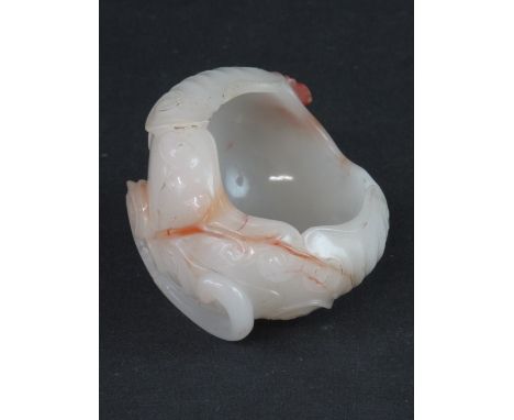 SMALL CHINESE WHITE JADE LOTUS LEAF NATURALISTIC BRUSH WASHER with butterfly and scroll work.  3.25" across (8cm).
Provenance