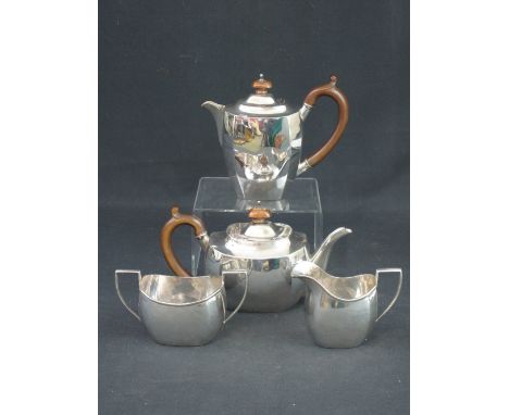 MATCHED FOUR PIECE SILVER TEA SET comprising: teapot; water jug; cream jug and sucrier, Birmingham and Chester hallmarks, 22 