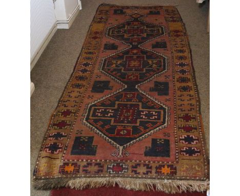 A hand woven Persian Hammadan runner measuring 100x320cm.