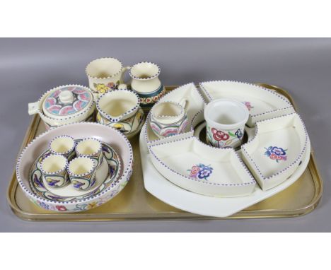 A tray lot of various Poole and Devon pottery items.