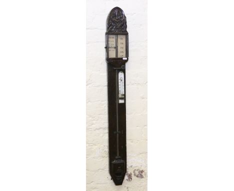 A 19th century carved pine stick barometer.