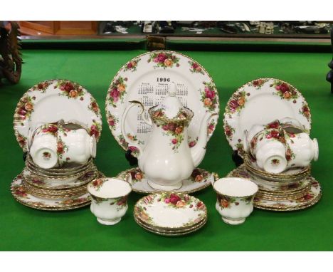 A Royal Albert part tea service decorated in the Old Country Rose pattern (approximately forty pieces).