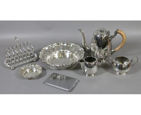 A Walker & Hall silver plated three part tea service and seven bar toastrack and three other pieces of silver plate.