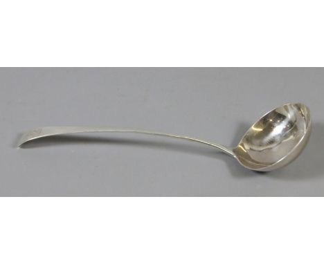 An early 19th century silver soup ladle engraved with a unicorn over a coronet. Partial marks on the lower handle, 152 grams.