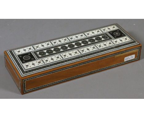 A Sadi work sandalwood box with cribbage board top.