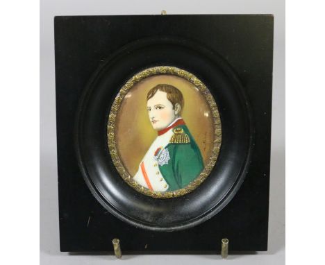 An ivory portrait miniature of Napoleon Bonaparte in ebonized frame. Signed M. Meisley.