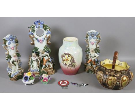 A collection of mixed ceramics including Royal Winton vase, Continental mantel garniture, two china posies and a faience bask