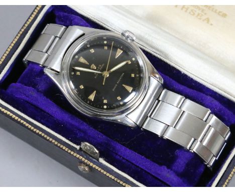 A gentlemans stainless steel Rolex Oyster Royal manual bracelet watch with screw down crown and in associated box. With black