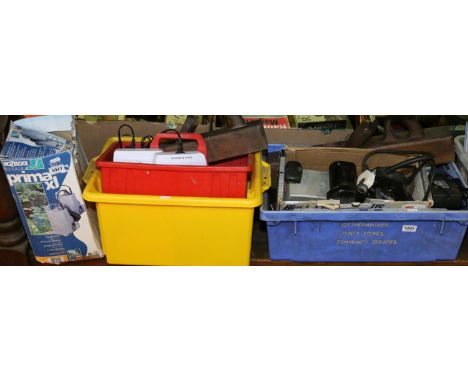 A collection of power and hand tools along with a hozelock pond pump.