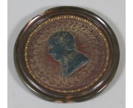 A 19th century commemorative portrait plaque of Napoleon Bonaparte in tortoiseshell frame.