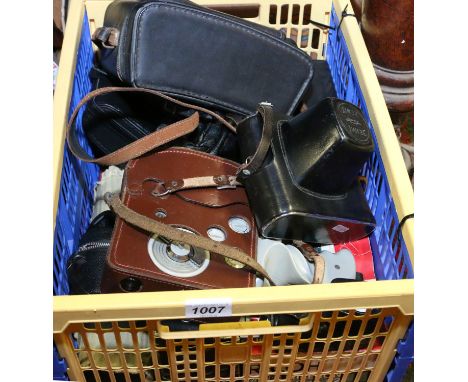 A collection of cameras, binoculars and lenses including Zenith, Eumig and Pentax, etc.