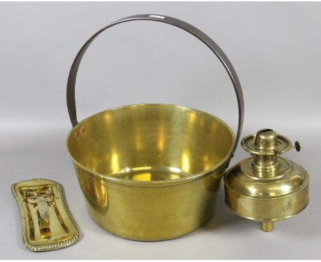 A Victorian brass jam pan, a pair of candle snuffers on tray and an oil lamp burner.