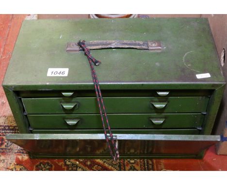 A lockable steel four drawer cabinet and contents of tools to include micrometers and respective receipt, drill bits, taps, w