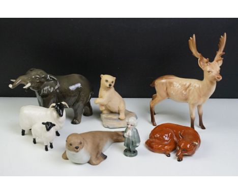 Collection of mostly Beswick ceramic animals to include an elephant, fox, stag, horned sheep as well as an Aynlsey seal and A