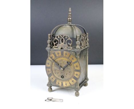 R.F. Beard Ltd of Cheltenham - A 19th Century brass mantel clock of square form with Roman numerals &amp; pierced brass mount