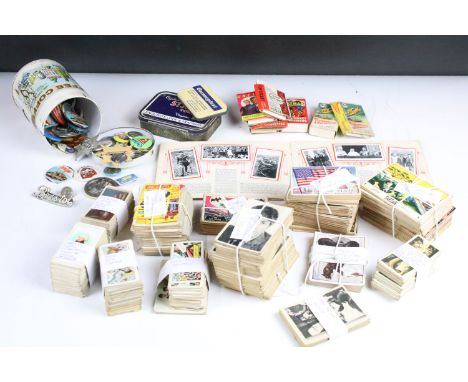 A box of mixed collectables to include cigarette cards, 1960's / 1970's button badges to include The Beatles examples, bubble