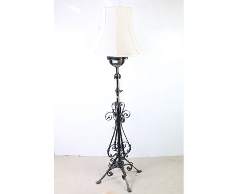 Late 19th Scrolling Wrought Iron Standard Oil Lamp with hammered coppered well, later converted to electric, with shade, 142c