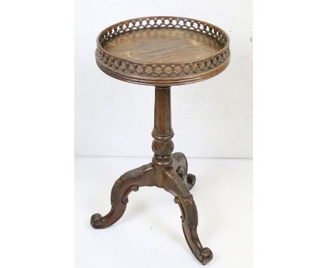 Mahogany Circular Lamp Table in the George III manner with pierced gallery, carved column and three splayed legs, 73cm high x