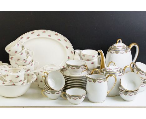 20th Century Limoges of France tea set with pink rose decoration (teapot, 12 cups &amp; saucers, milk jug &amp; sugar basin),