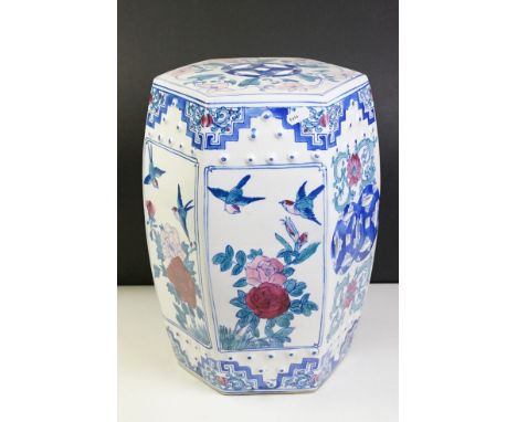 Chinese ceramic stool of hexagonal barrel form having transfer printed panels depicting florals and birds. Measures 36cm tall