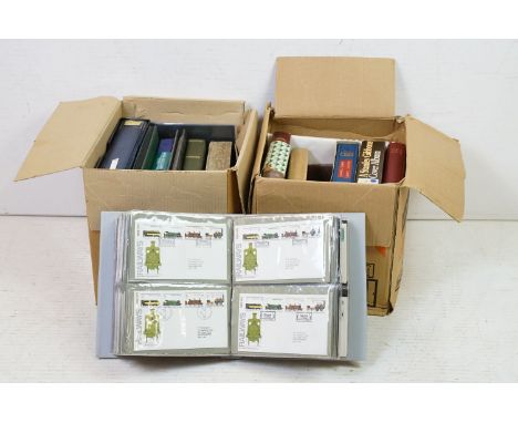 A collection of mainly Channel Islands first day covers within albums together with a quantity of empty stamp albums. 