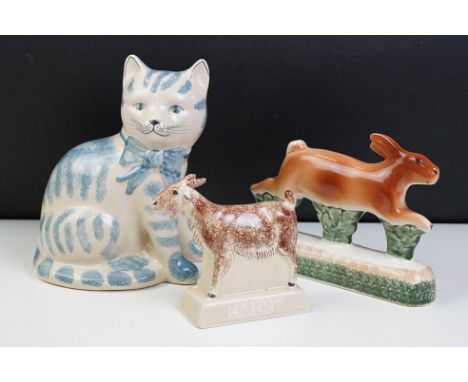 Three Rye pottery ceramic animals to include a blue and white cat, hare and goat. All with stamped marks to the bases. Cat me