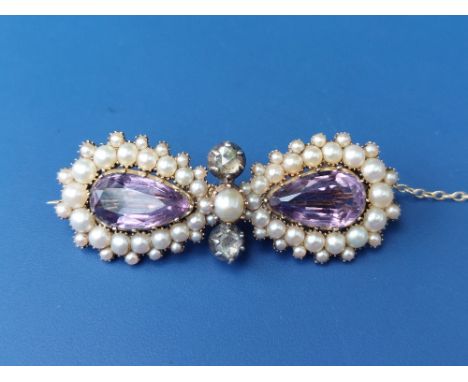 A pearl, rose cut diamond and amethyst brooch of figure-of-eight form, 1.75" across.