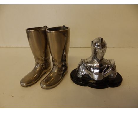 A novelty chrome knight in armour table lighter and a pair of boot stirrup cups, 3" high. (3)