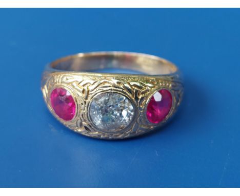 A Victorian diamond &amp; red stone 18ct gold band ring, the setting engraved with a Celtic knot strapwork design.  Finger si