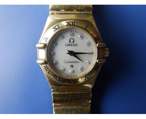 A ladies 18ct gold Omega Constellation bracelet wrist watch with diamond dot numerals to the mother-of-pearl dial, case diame