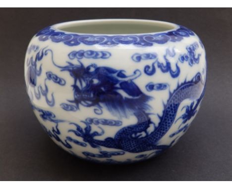 A Chinese blue &amp; white porcelain dragon jar, two confronting Imperial dragons chasing the flaming pearl amidst cloud scro