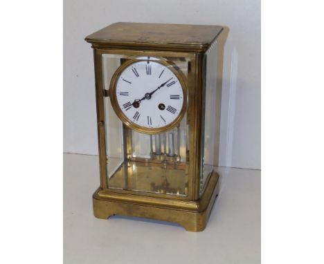 A Japy Freres four-glass clock with mercury pendulum, 10.75" high - hairline cracks to dial.