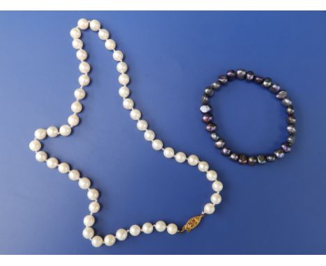 A  16.5" pearl necklace with Birmingham 9ct gold clasp and one other. (2)