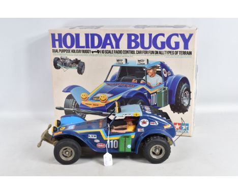 A BOXED CONSTRUCTED TAMIYA RIKO PLASTIC RADIO CONTROL DUAL PURPOSE HOLIDAY BUGGY, No.RA1023, 1/10 scale, not tested, has been