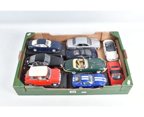 A QUANTITY OF UNBOXED AND ASSORTED 1/18 AND 1/24 SCALE CAR MODELS, to include Bburago 1/18 scale Jaguar E Type, Franklin Mint